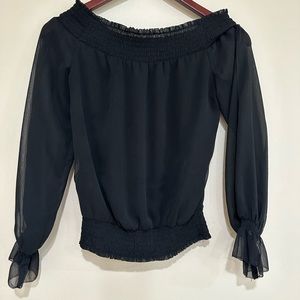Women’s Bebe black off the shoulder top. Long sleeve. Size small. Pre-owned